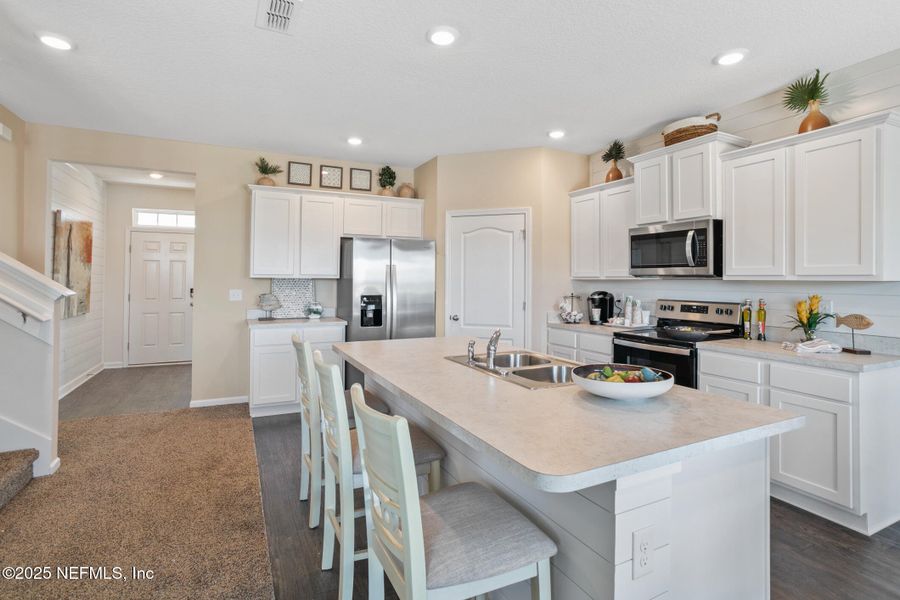 Furnished interior view inside a new home in Sawmill Branch, Palm Coast (Image 11).