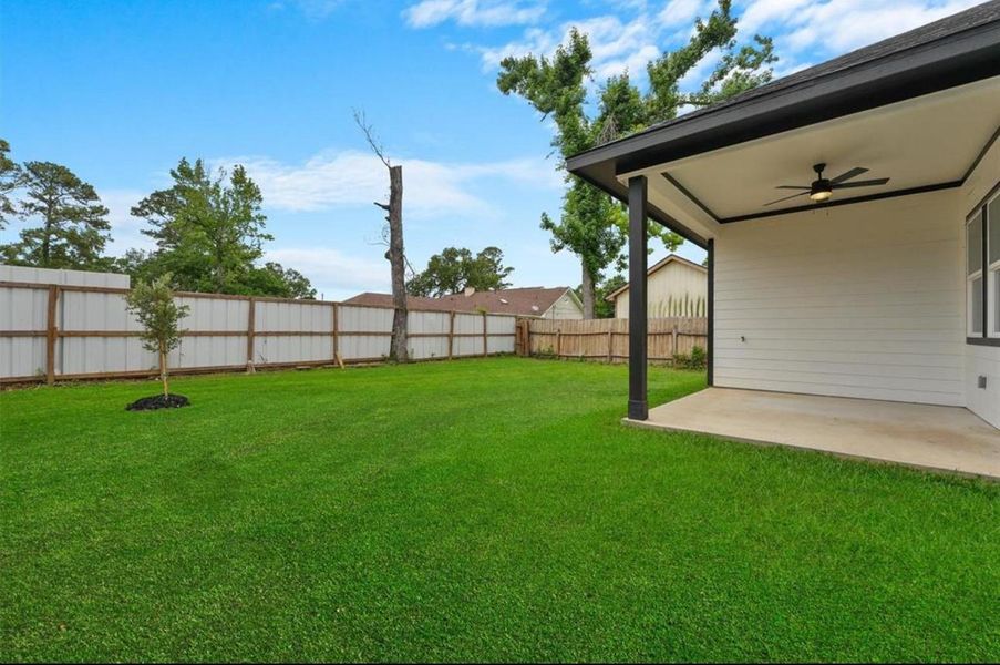 Exterior details and patio area of a home in , Houston (Image 4). Exterior details and patio area of a home in , Houston (Image 4).