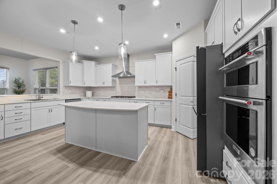 Furnished interior view inside a new home in Parkside Crossing, Charlotte (Image 7).