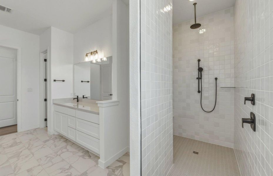 Furnished interior view inside a new home in 6 Creeks, Kyle (Image 8).