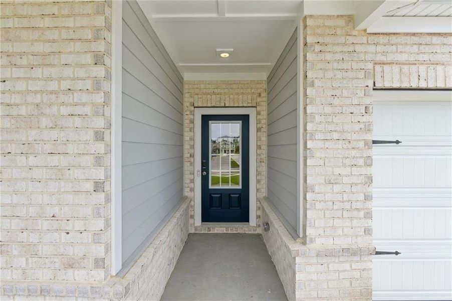 Exterior details and patio area of a home in Parkside at Grayson, Grayson (Image 32).