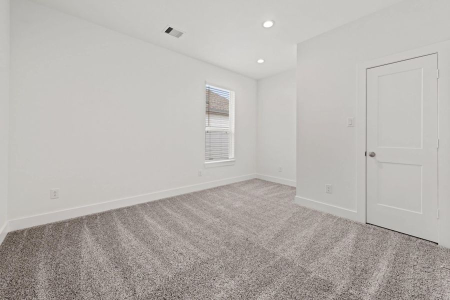 Representative unfurnished interior of a home built from the Rivers 60′ Lot by Chesmar Homes in Fulshear Lakes, Fulshear (Image 28).