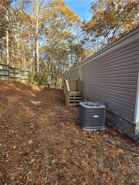 Exterior details and patio area of a home in , Ellijay (Image 2).
