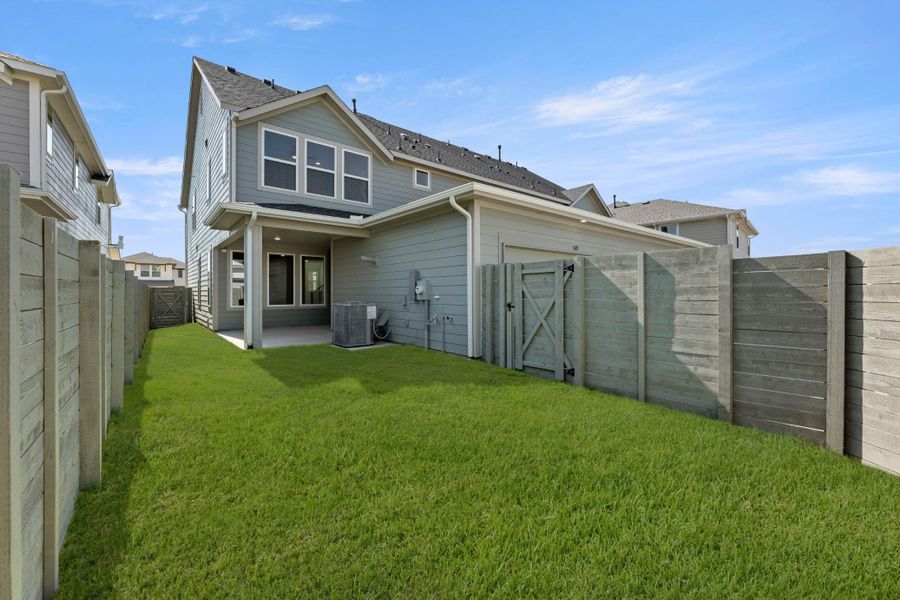 Exterior details and patio area of a home in Terrace Collection at Harvest, Argyle (Image 15).