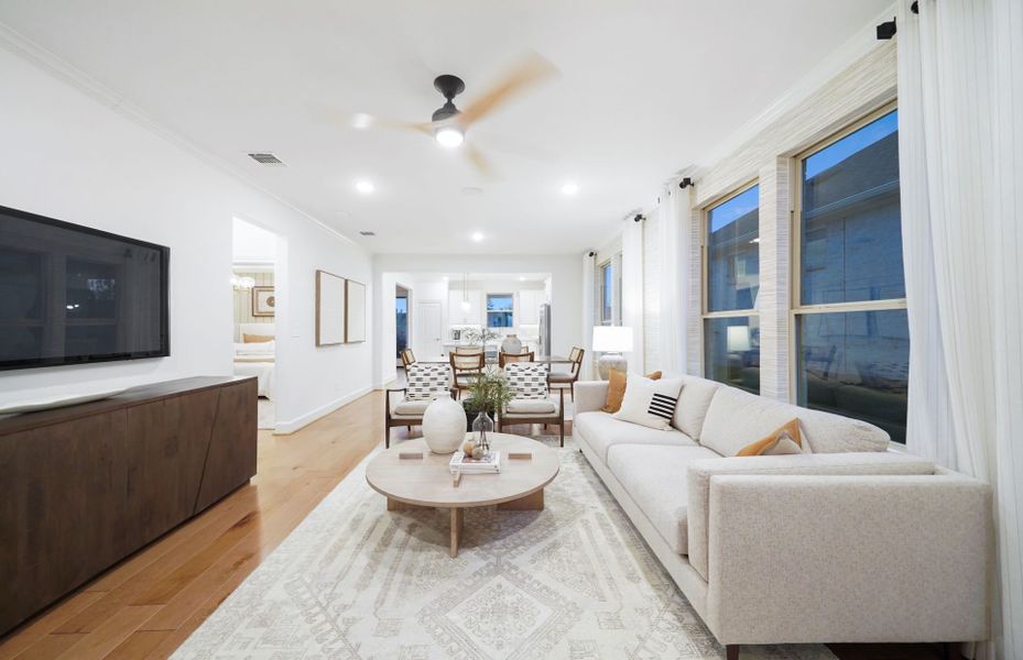 Representative furnished interior of a home built from the Flagstone by DiVosta in BeachWalk by Manasota Key, Englewood (Image 10).