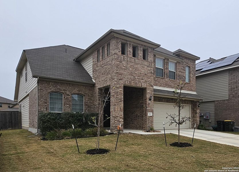 Front exterior of a new home in Rhine Valley, Schertz, TX, highlighting curb appeal (Image 2).
