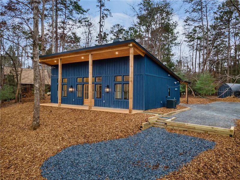 Exterior details and patio area of a home in , Ellijay (Image 30).