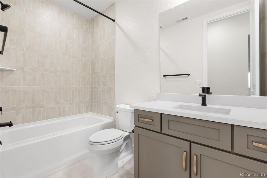 Furnished interior view inside a new home in Autograph at Lyric, Lone Tree (Image 28).