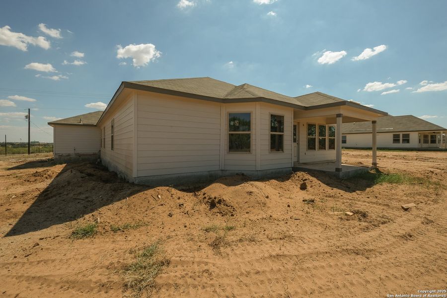 Exterior details and patio area of a home in Chaparral Ranch, Floresville (Image 19). Exterior details and patio area of a home in Chaparral Ranch, Floresville (Image 19).