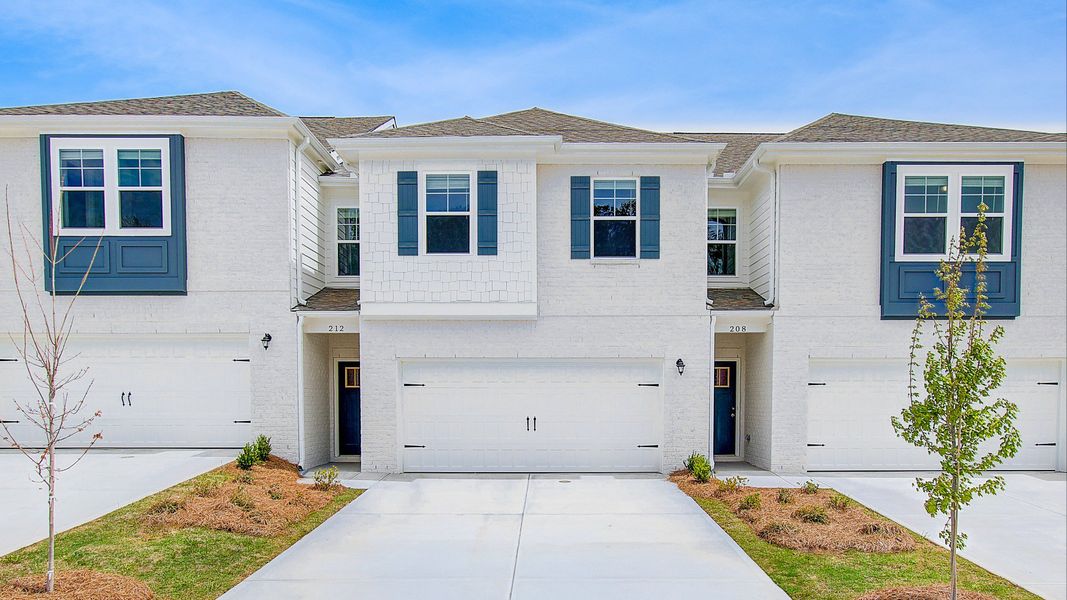 Representative exterior photo of a completed home built from the Austin by DRB Homes in Bowers Farm Townhomes, McDonough, GA (Image 21).
