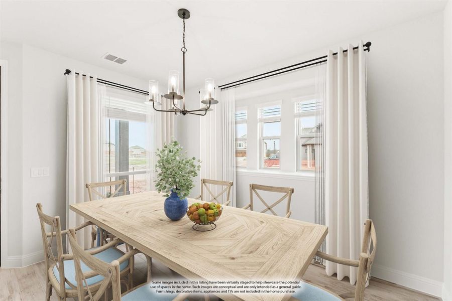 Dining room with wood table, six chairs, chandelier, and large windows with white curtains Dining room with wood table, six chairs, chandelier, and large windows with white curtains