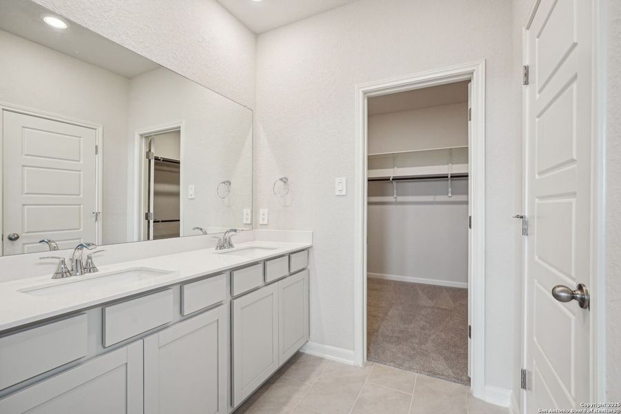 Furnished interior view inside a new home in Sagebrooke - Premier Series, San Antonio (Image 7). Furnished interior view inside a new home in Sagebrooke - Premier Series, San Antonio (Image 7).