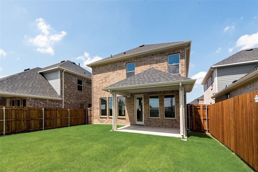 Exterior details and patio area of a home in Walden Pond, Forney (Image 3).