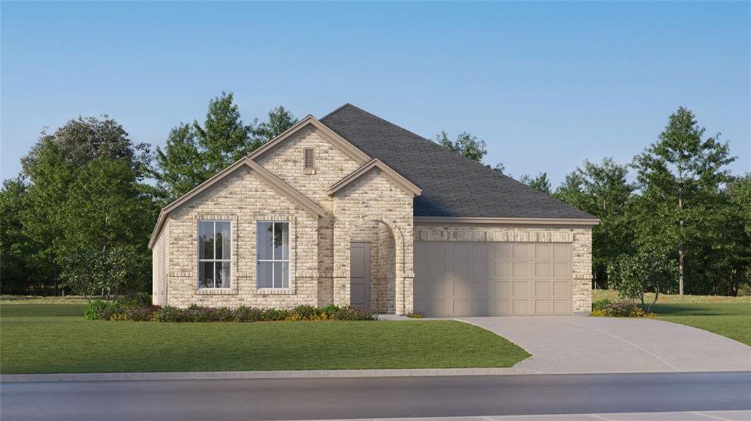 View of front of home featuring a front yard and a garage