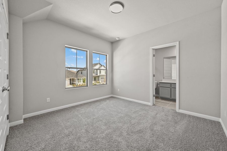 Bedroom in the Willow home plan by Trophy Signature Homes – REPRESENTATIVE PHOTO