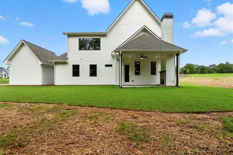 Exterior details and patio area of a home in Old Town Estates, Dacula (Image 3).