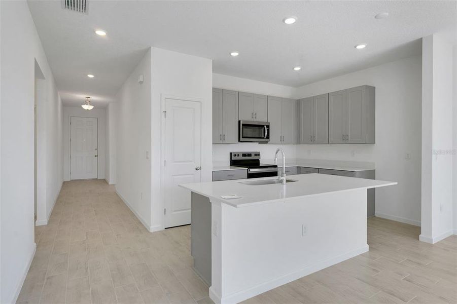 Furnished interior view inside a new home in Willowbrook North, Winter Haven (Image 7).