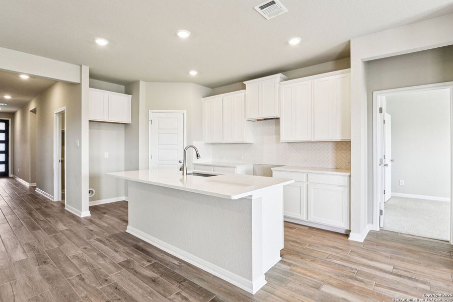 Furnished interior view inside a new home in Legendary Trails - Premier Series, Cibolo (Image 7). Furnished interior view inside a new home in Legendary Trails - Premier Series, Cibolo (Image 7).