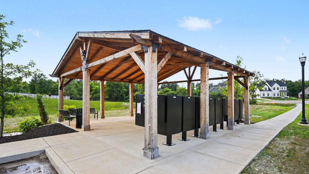 Pavilion over mail kiosk with sidewalks connecting to it Pavilion over mail kiosk with sidewalks connecting to it