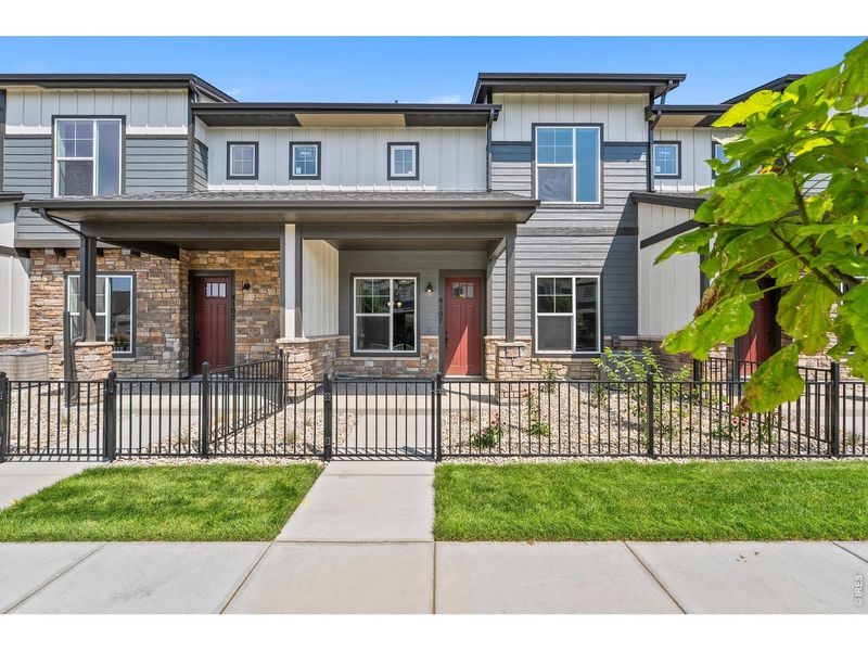 Exterior details and patio area of a home in The Lakes at Centerra, Loveland (Image 2).