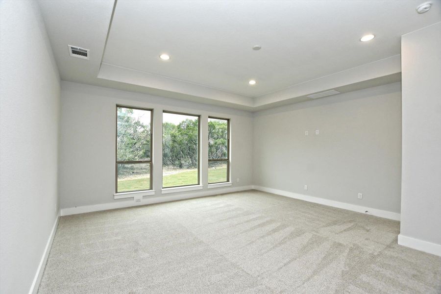 Spacious, unfurnished interior of a new home in The Hollows on Lake Travis, Leander (Image 27).