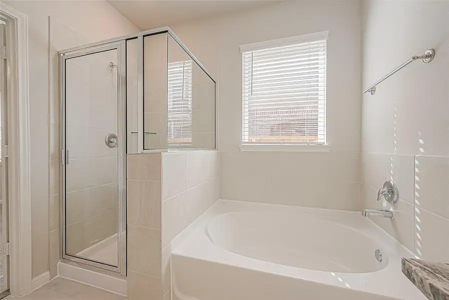 Furnished interior view inside a new home in Mill Creek Trails, Magnolia (Image 7).