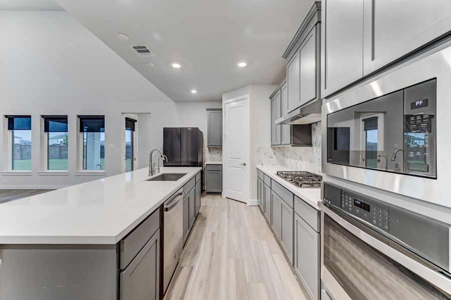 Furnished interior view inside a new home in , Cypress (Image 12).
