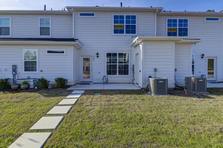 Exterior details and patio area of a home in Lake Carolina Townhomes, Columbia (Image 28).