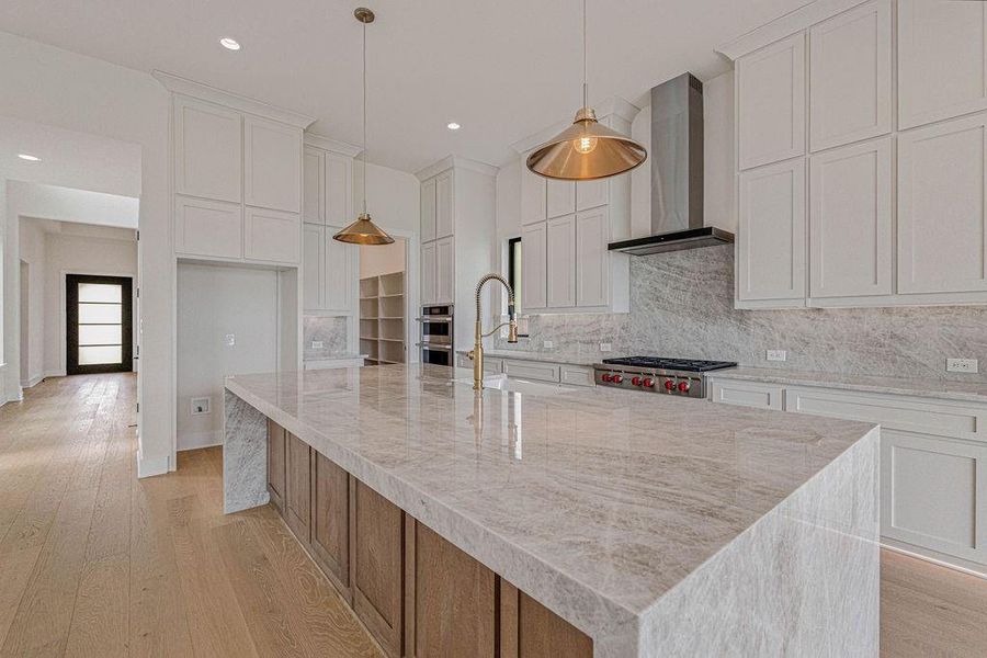 Shaker painted cabinets with pullouts, pots and pans drawers and cookie dividers.