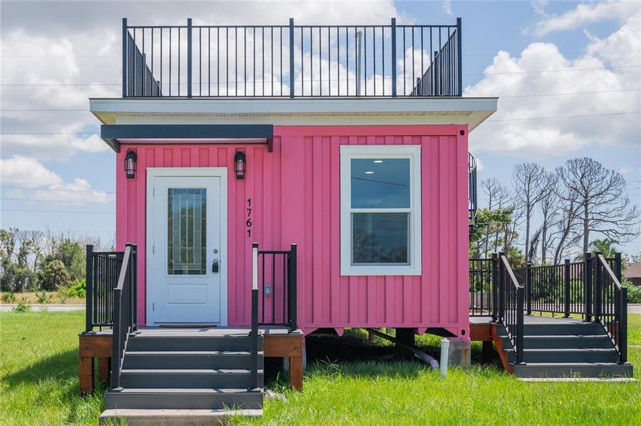 Front exterior of a new home in , Englewood, FL, highlighting curb appeal (Image 16). Front exterior of a new home in , Englewood, FL, highlighting curb appeal (Image 16).