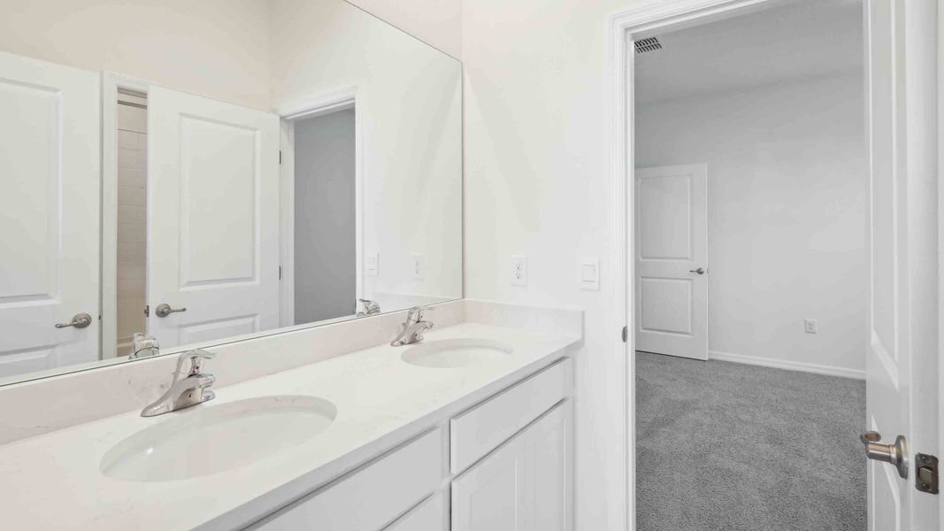 Representative furnished interior of a home built from the Camden by D.R. Horton in Ocala Preserve, Ocala (Image 18).
