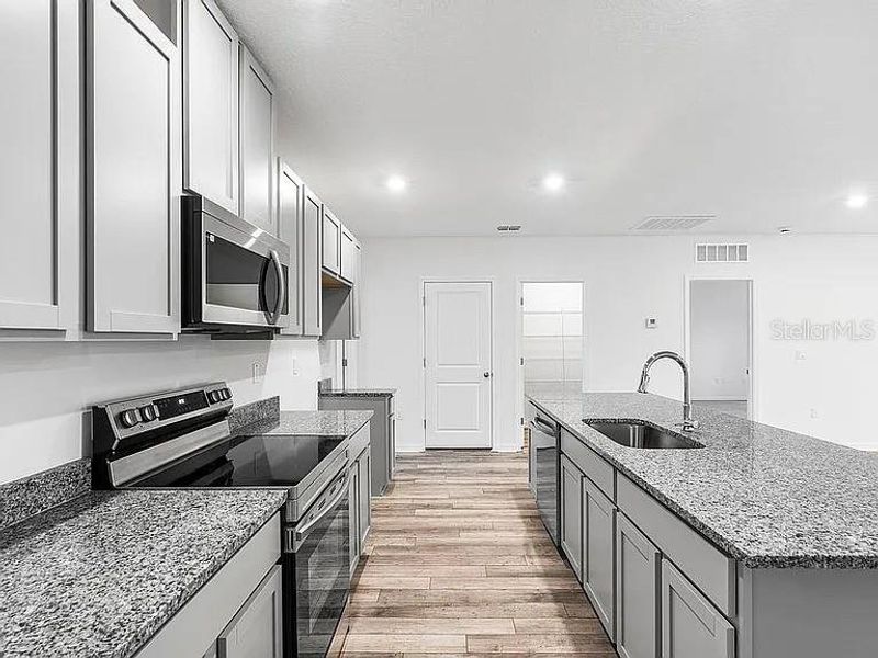 Furnished interior view inside a new home in Royal Highlands, Brooksville (Image 7).