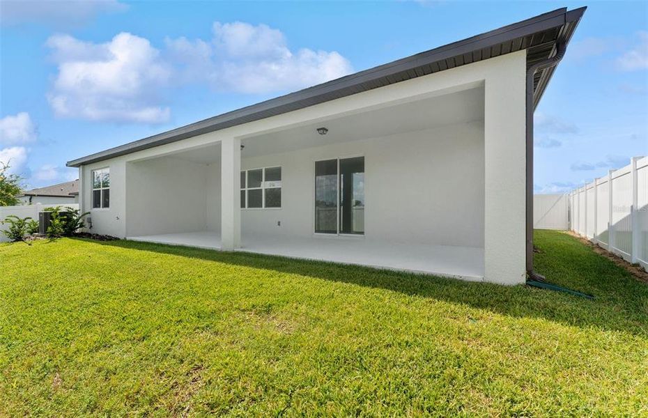 Front exterior of a new home in Marion Ranch, Ocala, FL, highlighting curb appeal (Image 17). Front exterior of a new home in Marion Ranch, Ocala, FL, highlighting curb appeal (Image 17).