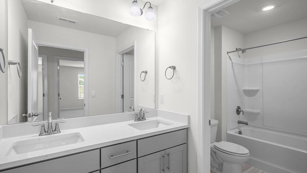 Furnished interior view inside a new home in Horton Park, Apex (Image 8).