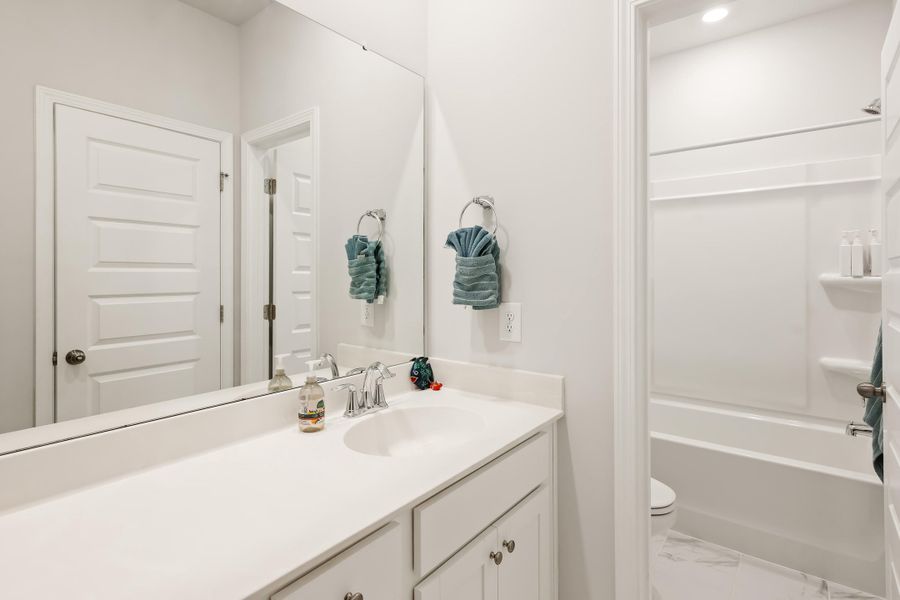 Furnished interior view inside a new home in Sweetgrass at Summers Corner, Summerville (Image 29).