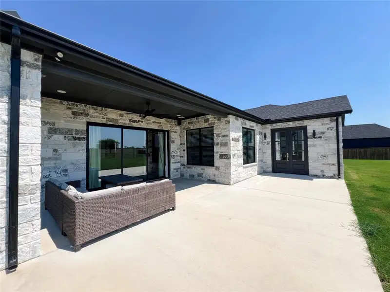 View of patio / terrace with ceiling fan and french doors