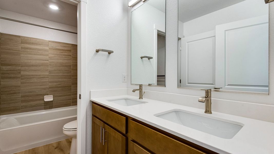 Furnished interior view inside a new home in Trails at Crowfoot, Parker (Image 14).