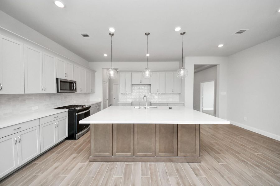 Furnished interior view inside a new home in Bridgeland: Signature Collection, Cypress (Image 8).