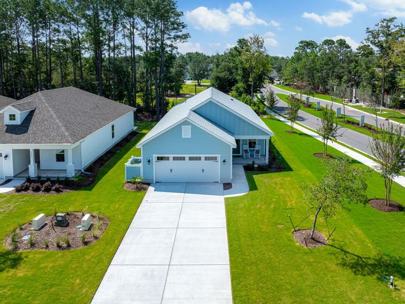 Representative exterior photo of a completed home built from the Salt Marsh by Bill Clark Homes in Osprey Landing, Southport, NC (Image 27).