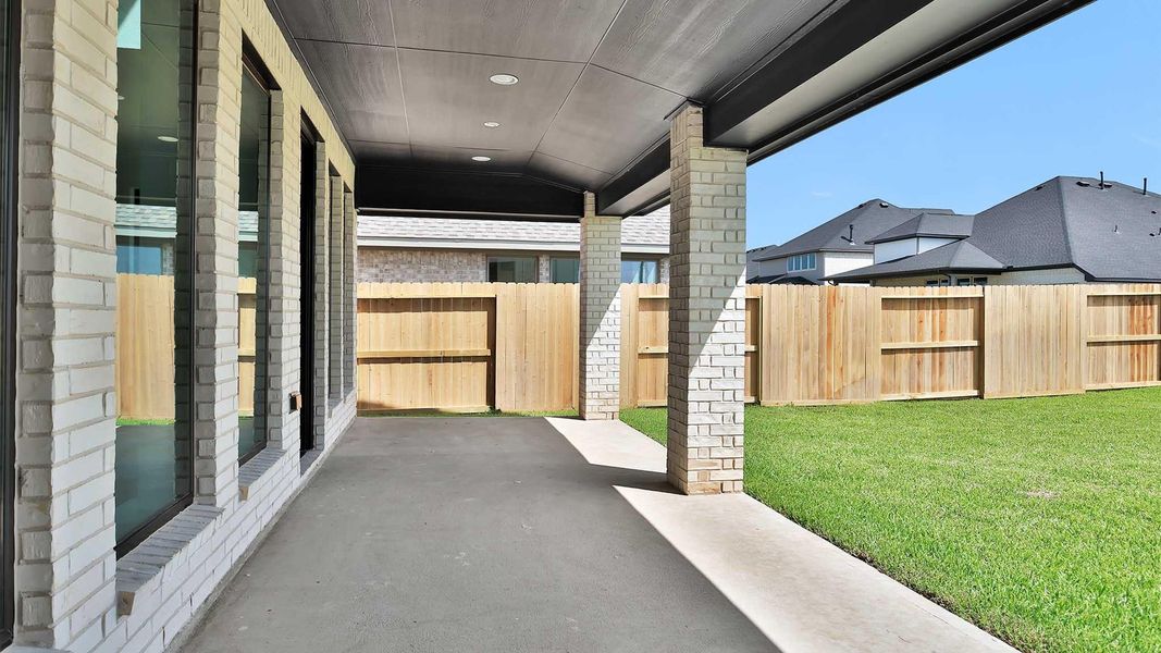 Exterior details and patio area of a home in Sienna, Missouri City (Image 2). Exterior details and patio area of a home in Sienna, Missouri City (Image 2).
