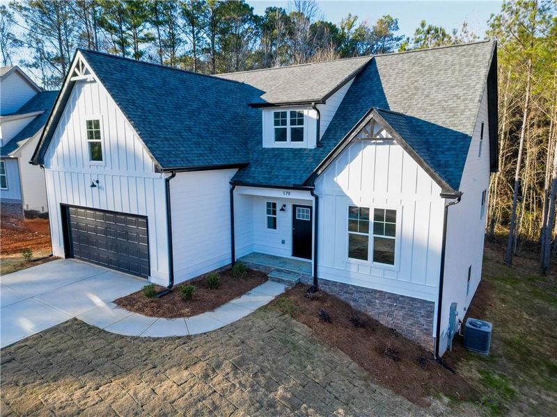 Front exterior of a new home in , Villa Rica, GA, highlighting curb appeal (Image 20).