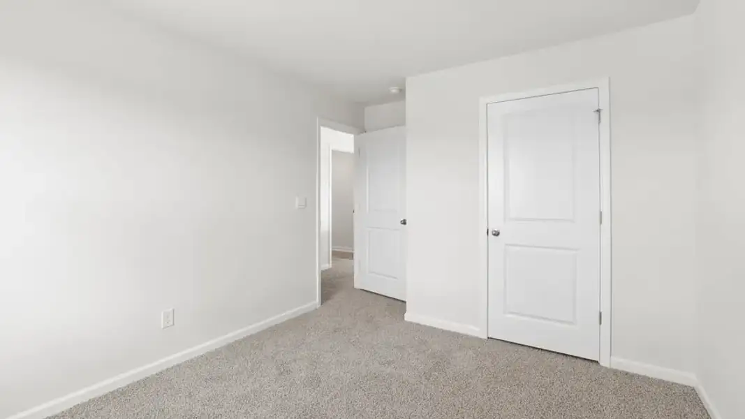 Representative unfurnished interior of a home built from the Belhaven by D.R. Horton in Lily Grove, Piedmont (Image 31).