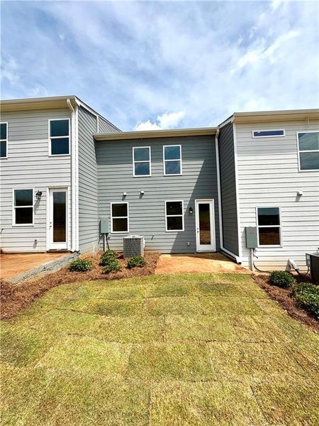 Front exterior of a new home in Stegall Village, Cartersville, GA, highlighting curb appeal (Image 78). Front exterior of a new home in Stegall Village, Cartersville, GA, highlighting curb appeal (Image 78).