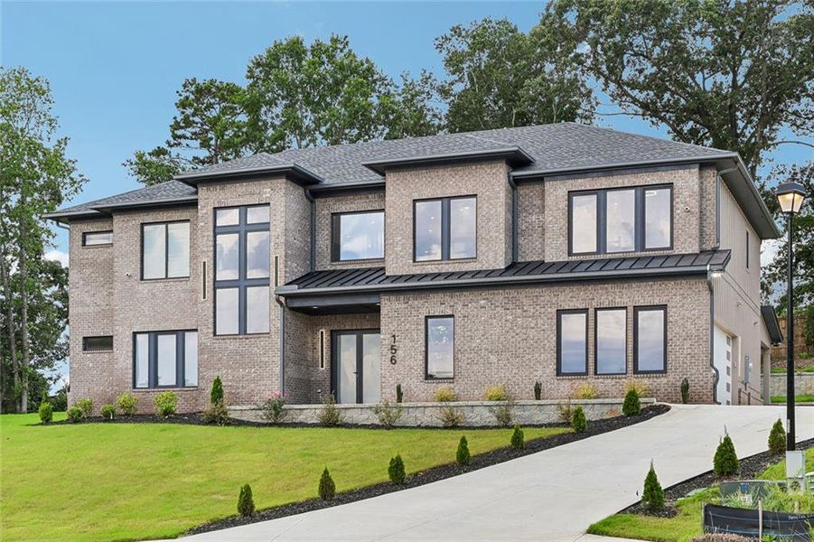 Front exterior of a new home in , Auburn, GA, highlighting curb appeal (Image 32). Front exterior of a new home in , Auburn, GA, highlighting curb appeal (Image 32).