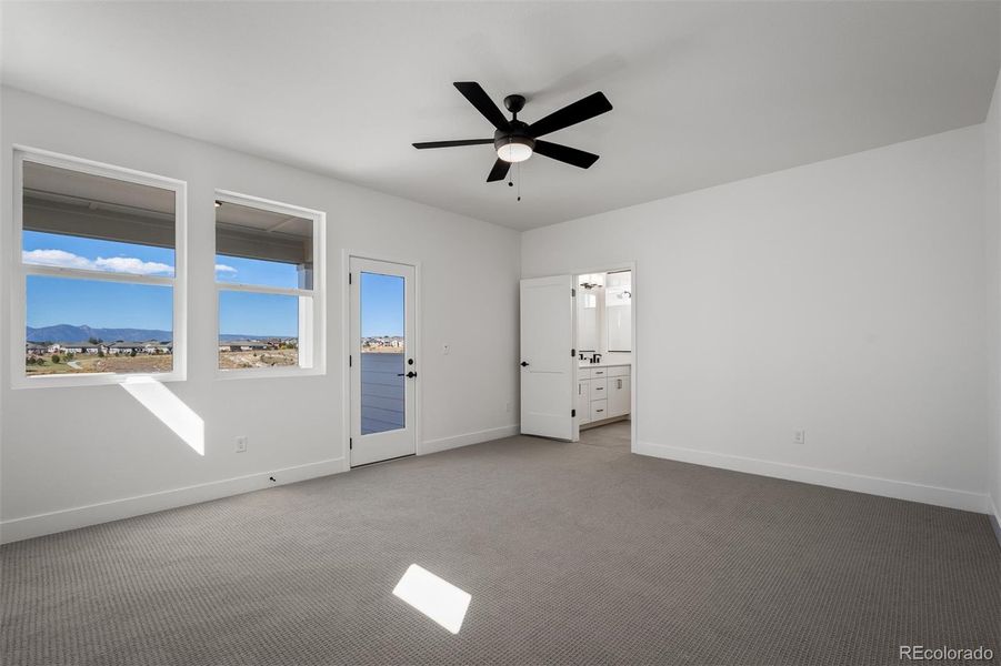Spacious, unfurnished interior of a new home in Revel Crossing at Wolf Ranch - The Panorama Collection, Colorado Springs (Image 34).