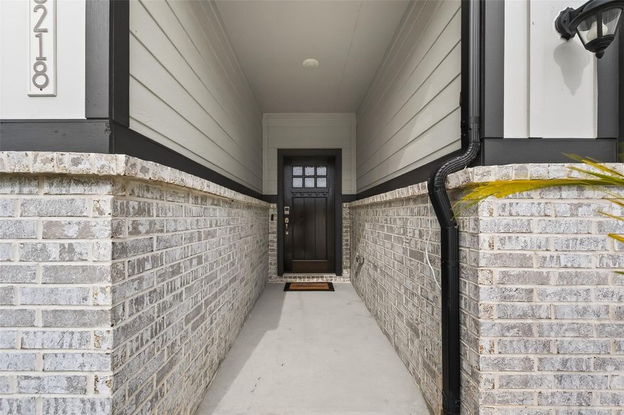Exterior details and patio area of a home in , Tomball (Image 31).