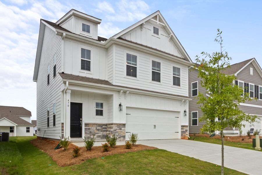Front exterior of a new home in The Pier South, Seneca, SC, highlighting curb appeal (Image 2). Front exterior of a new home in The Pier South, Seneca, SC, highlighting curb appeal (Image 2).