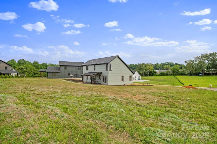 Front exterior of a new home in , Asheville, NC, highlighting curb appeal (Image 23).