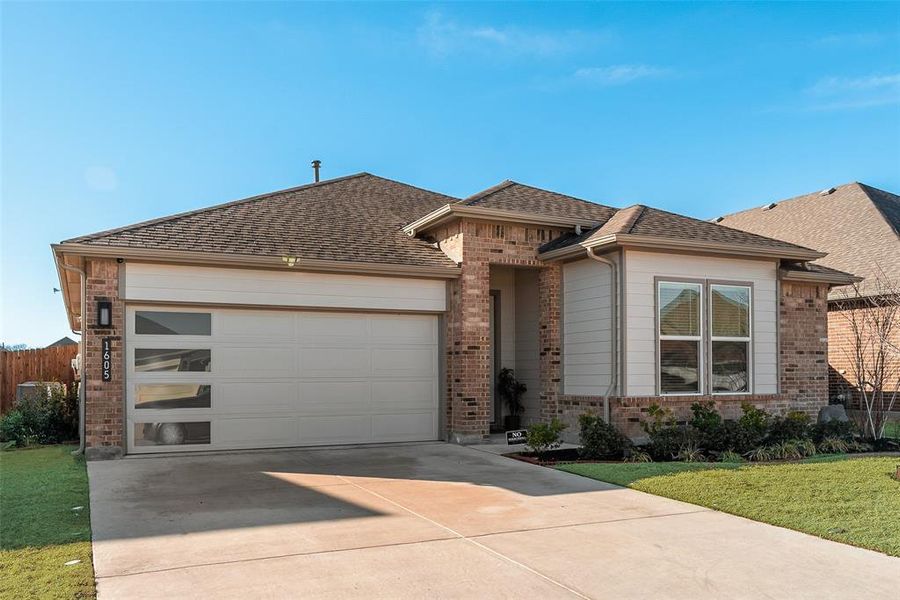 Front exterior of a new home in , Denton, TX, highlighting curb appeal (Image 22).