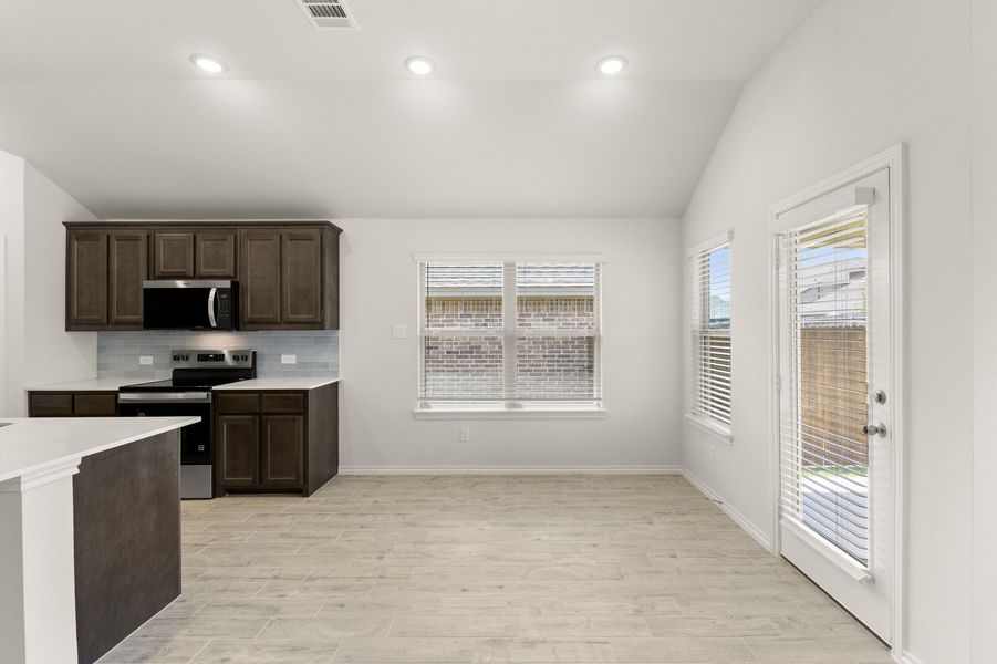 Front exterior of a new home in De Berry Reserve, Royse City, TX, highlighting curb appeal (Image 18).